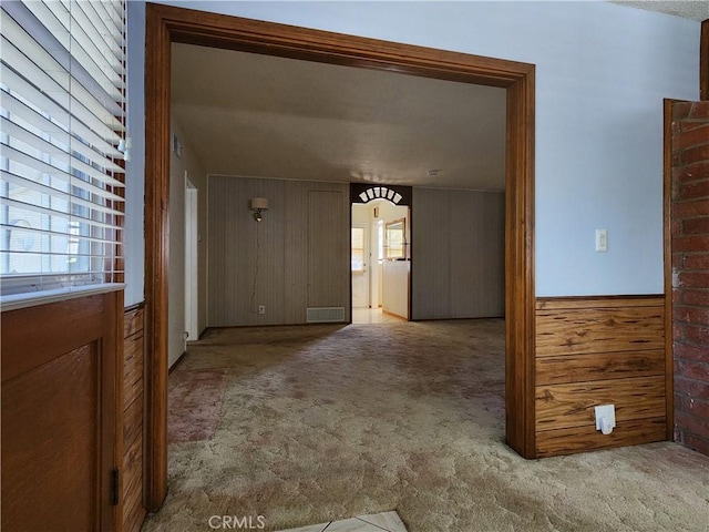 16708 Lawnwood St, La Puente, CA 91744 - corridor with carpet floors and wooden walls