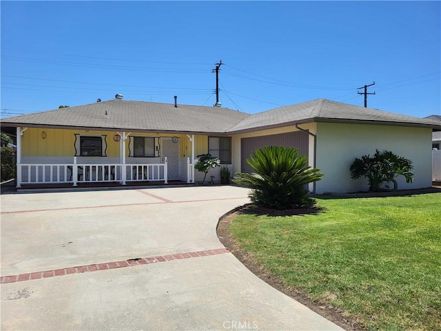 16708 Lawnwood St, La Puente, CA 91744 - ranch-style home with covered porch, concrete driveway, a front lawn, and a garage