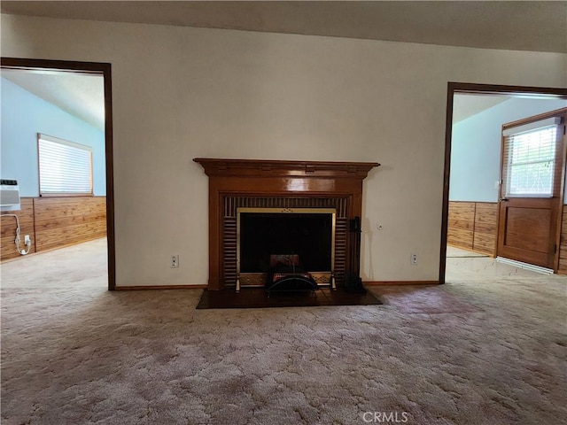 16708 Lawnwood St, La Puente, CA 91744 - detailed view of carpet, wooden walls, and a fireplace