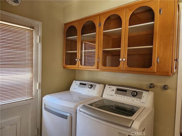 16708 Lawnwood St, La Puente, CA 91744 - washroom with separate washer and dryer and cabinet space