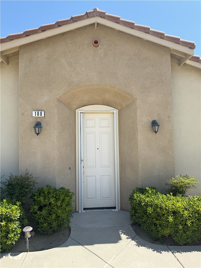 896 Poppyseed Way, Hemet, CA 92545 - doorway to property featuring stucco siding