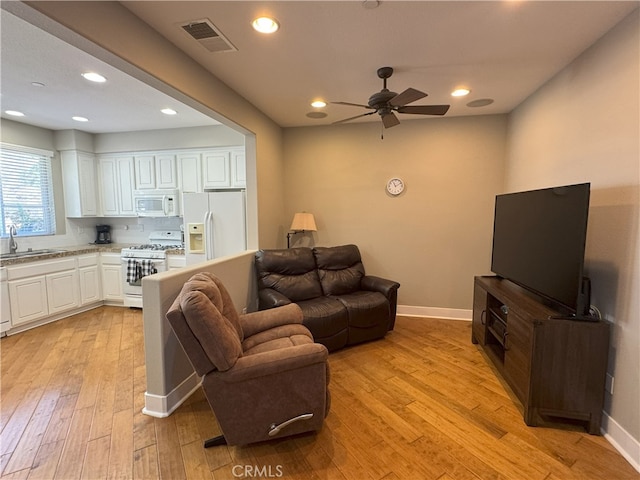 896 Poppyseed Way, Hemet, CA 92545 - living area featuring a ceiling fan, light wood-type flooring, and recessed lighting