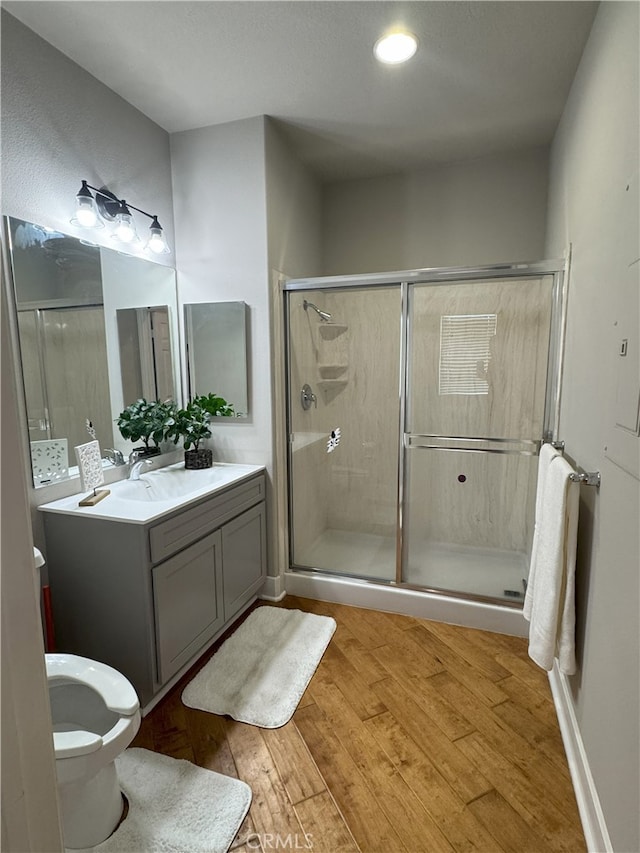 896 Poppyseed Way, Hemet, CA 92545 - full bath featuring wood finished floors, vanity, and a shower stall