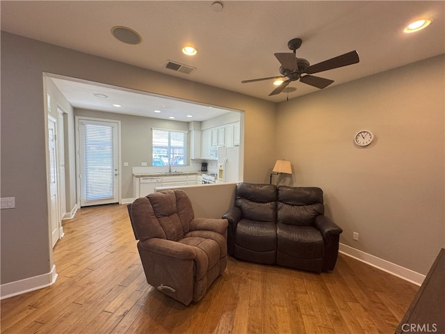 896 Poppyseed Way, Hemet, CA 92545 - living area featuring light wood-style floors, ceiling fan, and recessed lighting