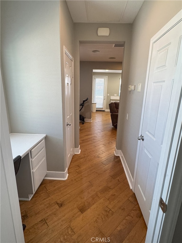 896 Poppyseed Way, Hemet, CA 92545 - corridor featuring wood finished floors and baseboards