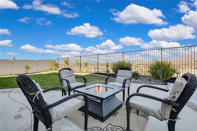 35212 Smith Ave, Beaumont, CA 92223 - fenced backyard with an outdoor fire pit and a patio