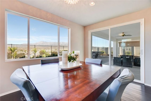 35212 Smith Ave, Beaumont, CA 92223 - dining area with healthy amount of natural light, a mountain view, wood finished floors, ceiling fan, and recessed lighting