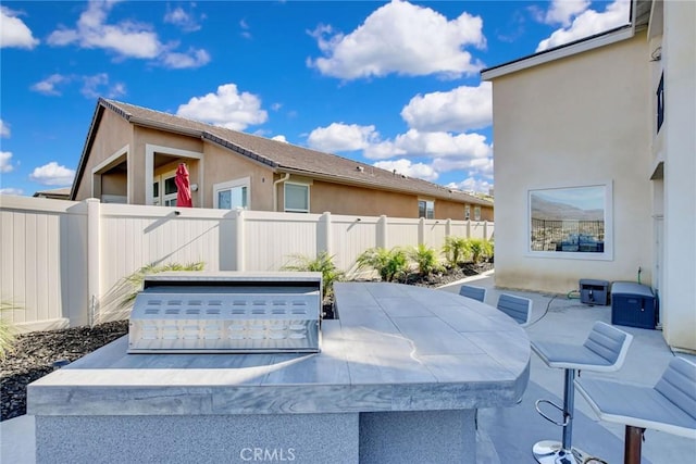 35212 Smith Ave, Beaumont, CA 92223 - fenced backyard featuring a patio area and outdoor dining space