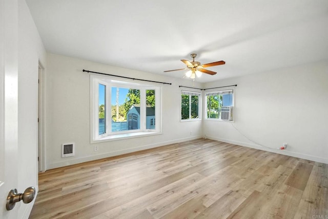 493133 Auburn, San Diego, CA 92105 - unfurnished room with light wood-style floors and ceiling fan