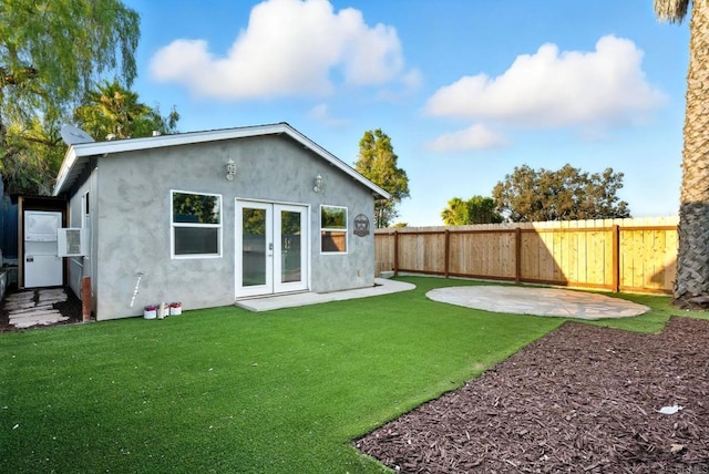 493133 Auburn, San Diego, CA 92105 - back of house featuring a fenced backyard, stucco siding, a patio, and french doors