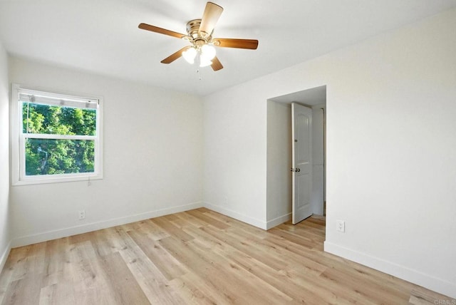 493133 Auburn, San Diego, CA 92105 - unfurnished room featuring light wood finished floors and ceiling fan