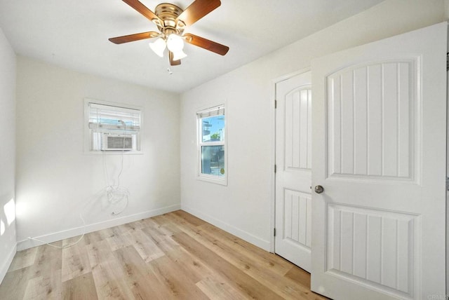493133 Auburn, San Diego, CA 92105 - unfurnished bedroom featuring light wood finished floors, cooling unit, and ceiling fan