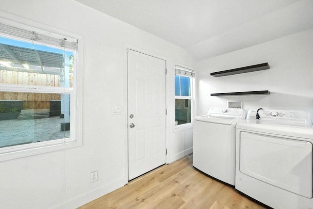 493133 Auburn, San Diego, CA 92105 - laundry room with independent washer and dryer and light wood finished floors