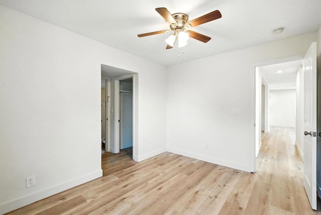493133 Auburn, San Diego, CA 92105 - unfurnished room featuring a ceiling fan, light wood-type flooring, and a smoke detector