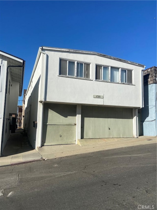 135 28th St, Hermosa Beach, CA 90254 - view of property featuring an attached garage
