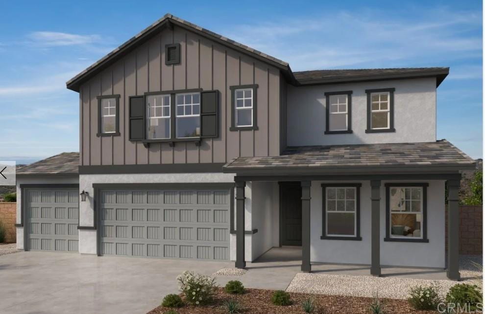 3141 Smith Pl, Escondido, CA 92027 - view of front facade with board and batten siding, a porch, an attached garage, and concrete driveway