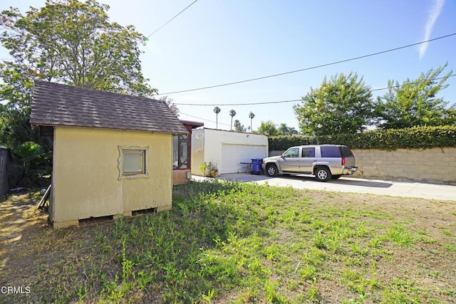 317 N Primrose Ave, Alhambra, CA 91801 - view of yard featuring an outdoor structure and a garage