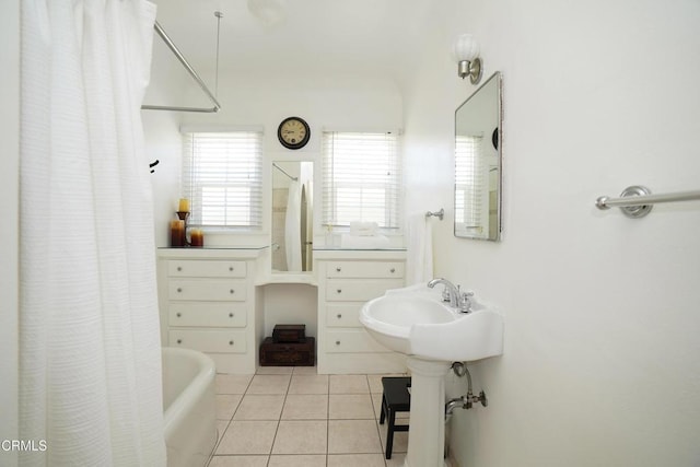 317 N Primrose Ave, Alhambra, CA 91801 - bathroom featuring tile patterned flooring, a tub, and a shower with shower curtain