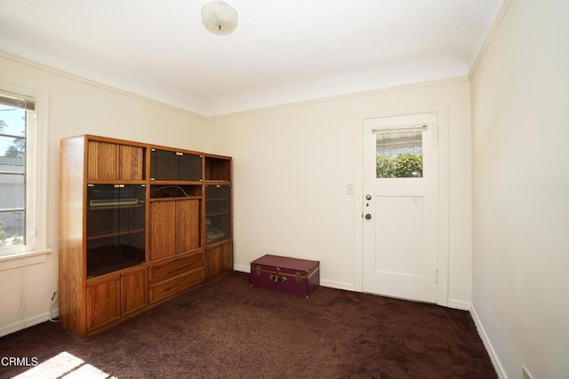 317 N Primrose Ave, Alhambra, CA 91801 - entryway featuring healthy amount of natural light, dark carpet, and ornamental molding
