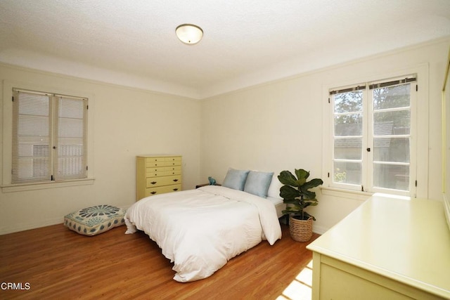 317 N Primrose Ave, Alhambra, CA 91801 - bedroom featuring light wood finished floors and baseboards