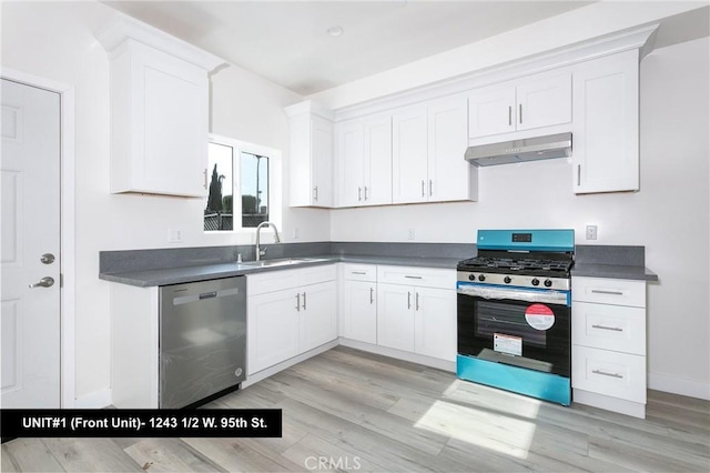 1241 W 95th St, Los Angeles, CA 90044 - kitchen with appliances with stainless steel finishes, under cabinet range hood, white cabinetry, and dark countertops