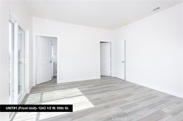 1241 W 95th St, Los Angeles, CA 90044 - empty room featuring wood finished floors