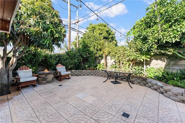2901 Huston St, Pomona, CA 91767 - fenced backyard with a fire pit and a patio