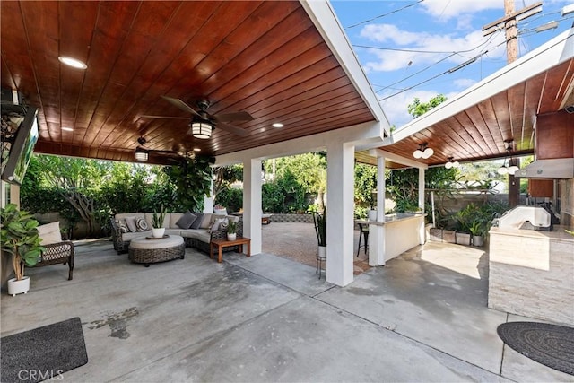 2901 Huston St, Pomona, CA 91767 - view of patio / terrace featuring outdoor lounge area, a ceiling fan, an outdoor bar, and an outdoor kitchen