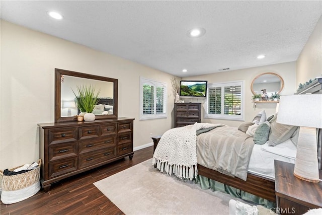 2901 Huston St, Pomona, CA 91767 - bedroom with dark wood-style flooring, recessed lighting, and a textured ceiling