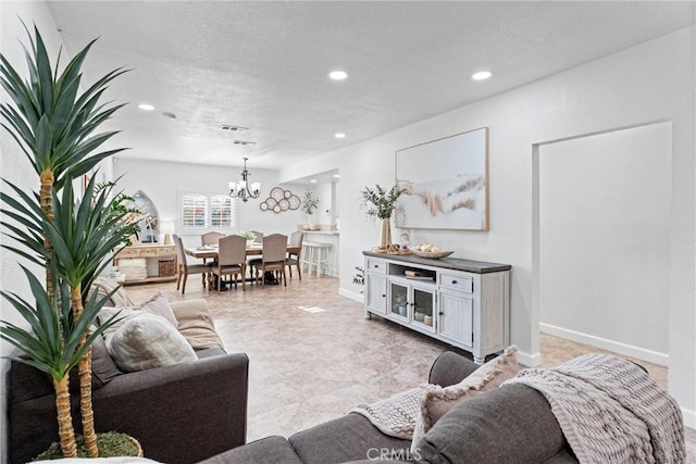 2901 Huston St, Pomona, CA 91767 - living room with a chandelier and recessed lighting