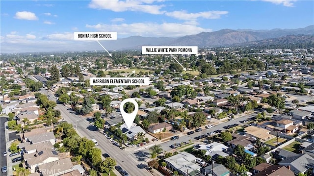 2901 Huston St, Pomona, CA 91767 - aerial view of property's location with a mountainous background and nearby suburban area