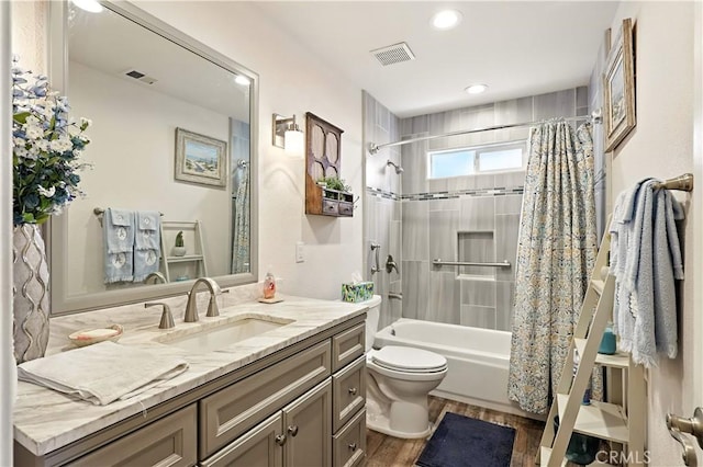 1115 Chennault Ave, Clovis, CA 93611 - bathroom with vanity, wood finished floors, shower / bathtub combination with curtain, and recessed lighting