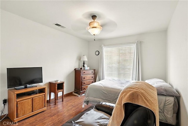 1115 Chennault Ave, Clovis, CA 93611 - bedroom featuring wood finished floors and a ceiling fan