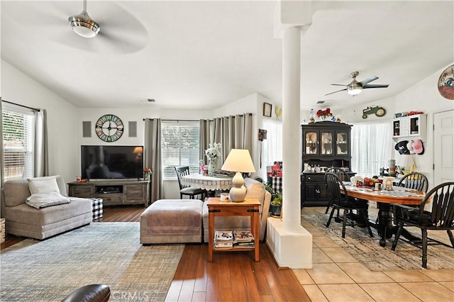 1115 Chennault Ave, Clovis, CA 93611 - living area with ceiling fan, vaulted ceiling, wood finished floors, and decorative columns