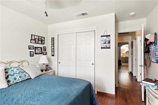 1115 Chennault Ave, Clovis, CA 93611 - bedroom featuring dark wood-type flooring and a closet