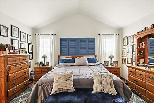 1115 Chennault Ave, Clovis, CA 93611 - bedroom featuring lofted ceiling and multiple windows