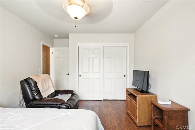 1115 Chennault Ave, Clovis, CA 93611 - bedroom featuring dark wood-style floors, a closet, and a ceiling fan