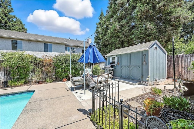 1115 Chennault Ave, Clovis, CA 93611 - view of pool featuring a fenced backyard, a patio area, and a shed
