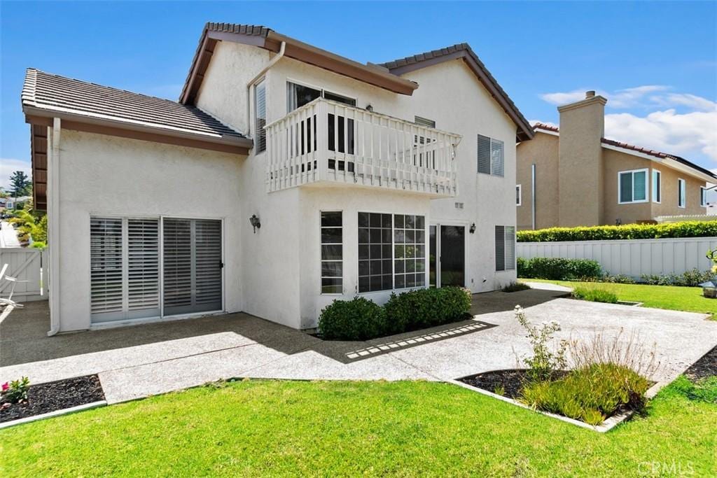 3514 Sitio Baya, Carlsbad, CA 92009 - rear view of property with a balcony, a patio area, stucco siding, and a tiled roof