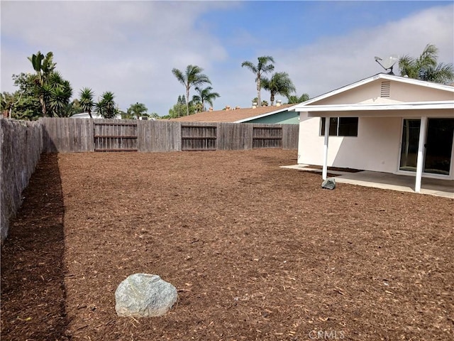 4493 Estada, Oceanside, CA 92057 - fenced backyard featuring a patio area
