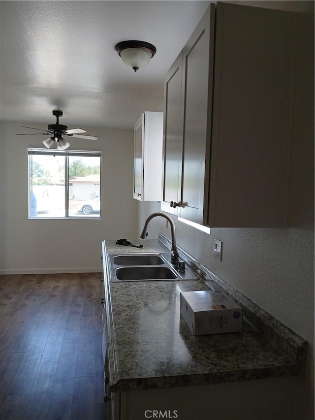 4493 Estada, Oceanside, CA 92057 - kitchen with ceiling fan, wood finished floors, and a textured wall