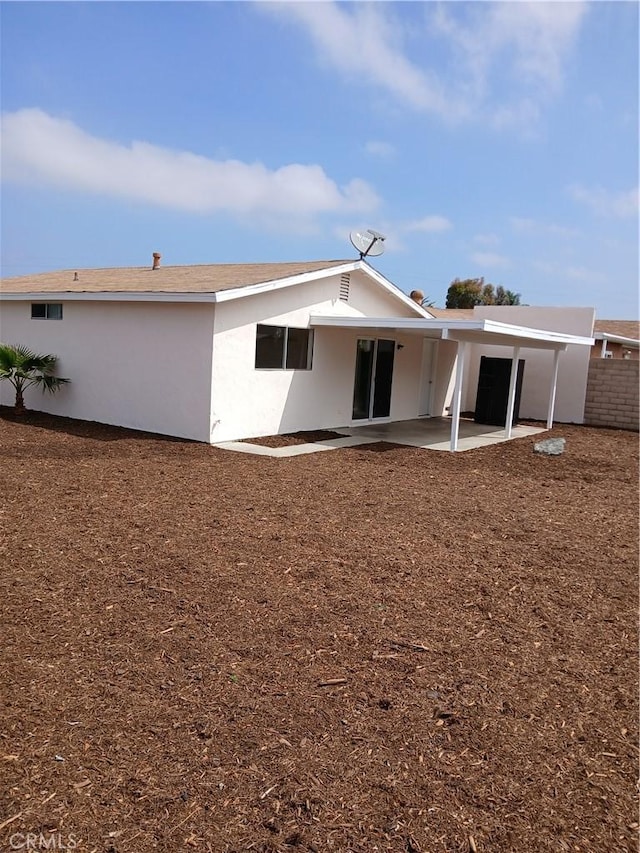 4493 Estada, Oceanside, CA 92057 - back of property with a patio and stucco siding