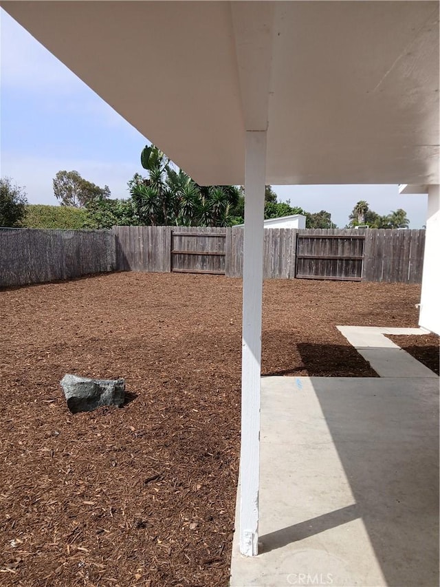 4493 Estada, Oceanside, CA 92057 - fenced backyard featuring a patio
