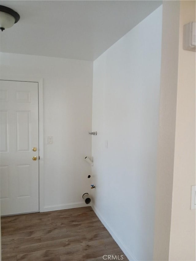 4493 Estada, Oceanside, CA 92057 - laundry room with wood finished floors and baseboards