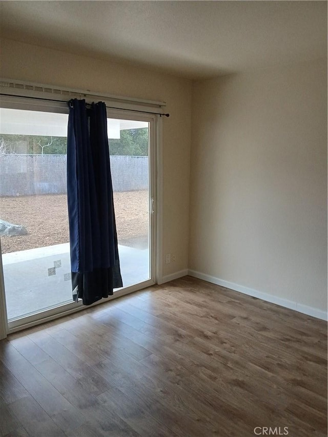 4493 Estada, Oceanside, CA 92057 - unfurnished room featuring wood finished floors