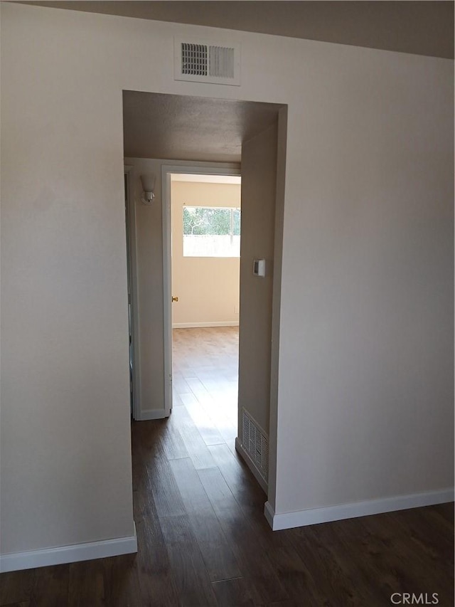 4493 Estada, Oceanside, CA 92057 - hall with baseboards and dark wood-type flooring