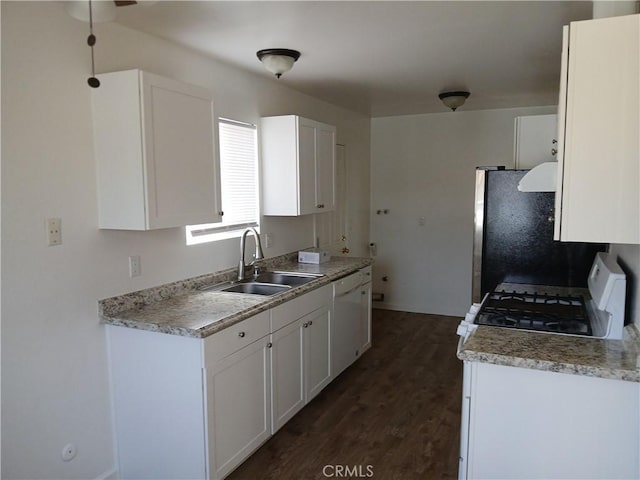 4493 Estada, Oceanside, CA 92057 - kitchen with white dishwasher, dark wood-style floors, white cabinets, light countertops, and stove