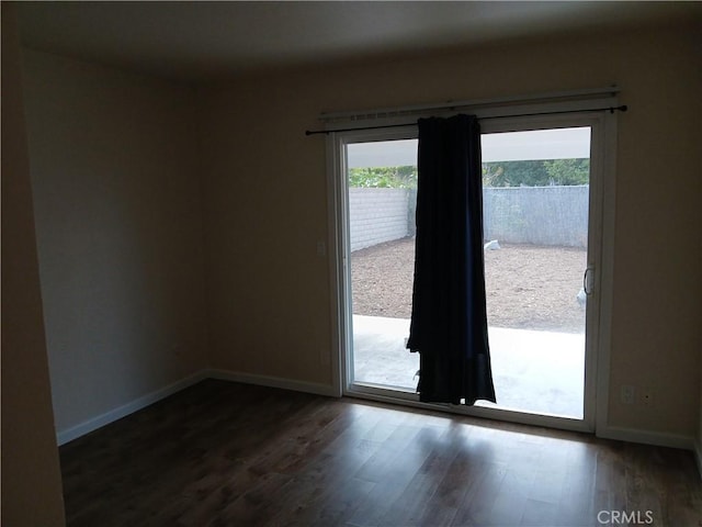 4493 Estada, Oceanside, CA 92057 - empty room with dark wood-type flooring