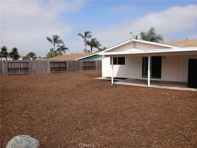 4493 Estada, Oceanside, CA 92057 - rear view of house featuring a patio, a fenced backyard, and stucco siding