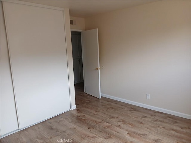 4493 Estada, Oceanside, CA 92057 - spare room featuring light wood-type flooring and baseboards